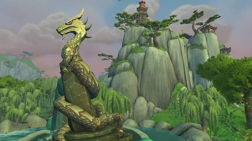 A large jade serpent statue with mountain pagodas in the Jade Forest.