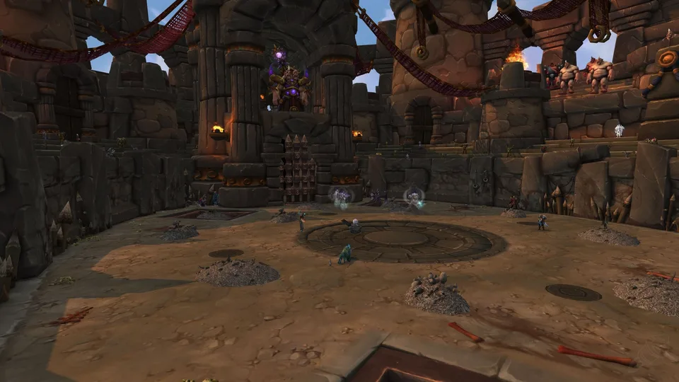 An ogre arena with a few players and NPCs.