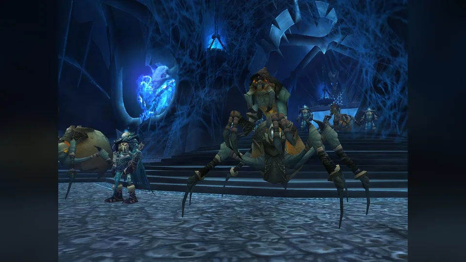 Player and a large spider NPC in a blue webbed Icecrown Citadel hall.